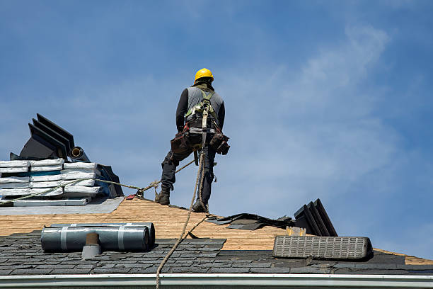 Professional Roofing technician working in Conover, OH